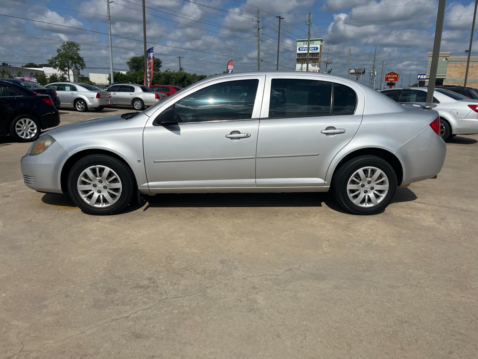 2009 SILVER /black Chevrolet Cobalt LS Sedan (1G1AS58H697) with an 2.2L L4 DOHC 16V engine, 4-Speed Automatic Overdrive transmission, located at 14700 Tomball Parkway 249, Houston, TX, 77086, (281) 444-2200, 29.928619, -95.504074 - Photo #3
